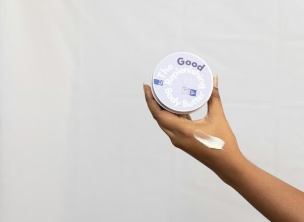 Hands applying cream as part of a skin-care routine